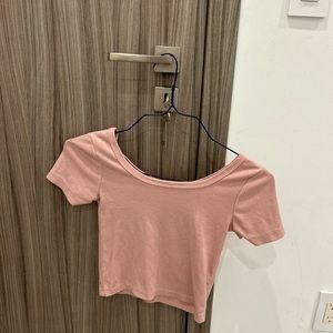 Pink scoop neck shirt slightly cropped